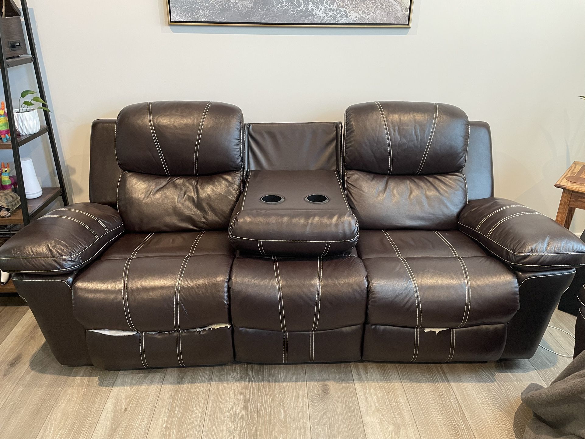 Dual power reclining leather couch and loveseat set
