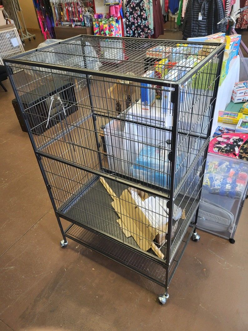 Large bird cage on wheels $100 new
