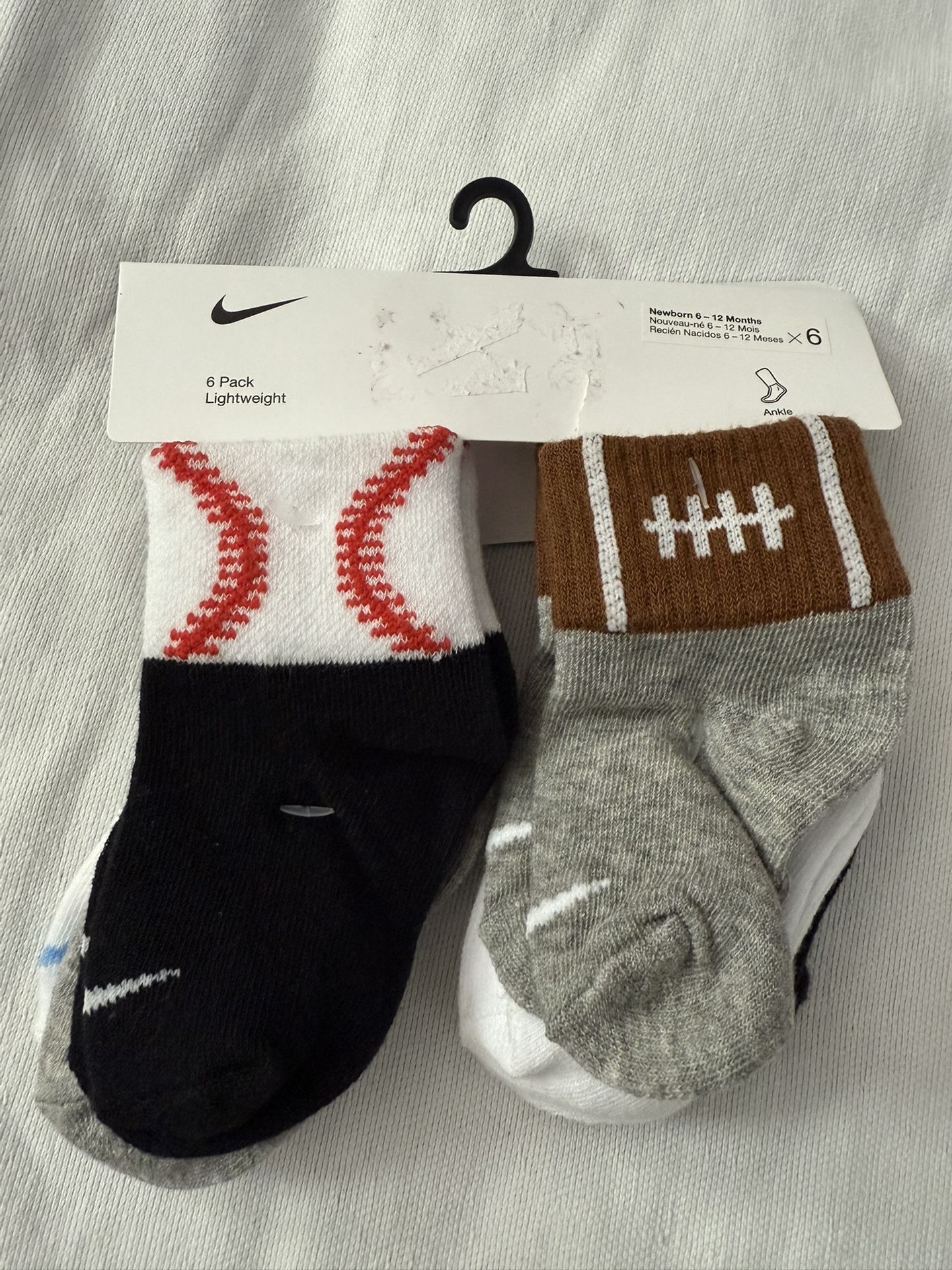 $5 NIKE SOCKS 6 PACK SOCKS 6-12 MONTHS $5 EACH PACK