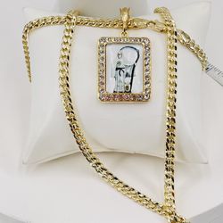 La Santa Muerte y Cadena oró laminado 14k/the grim reaper and 14k gold plated chain