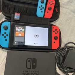 Nintendo Switch with Red Blue Joycons and accessories bundle