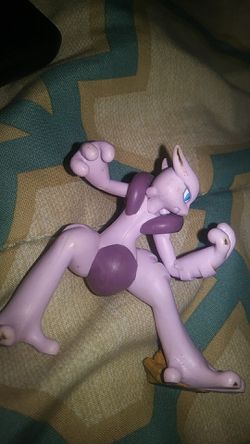 Mewtwo toy and Pin