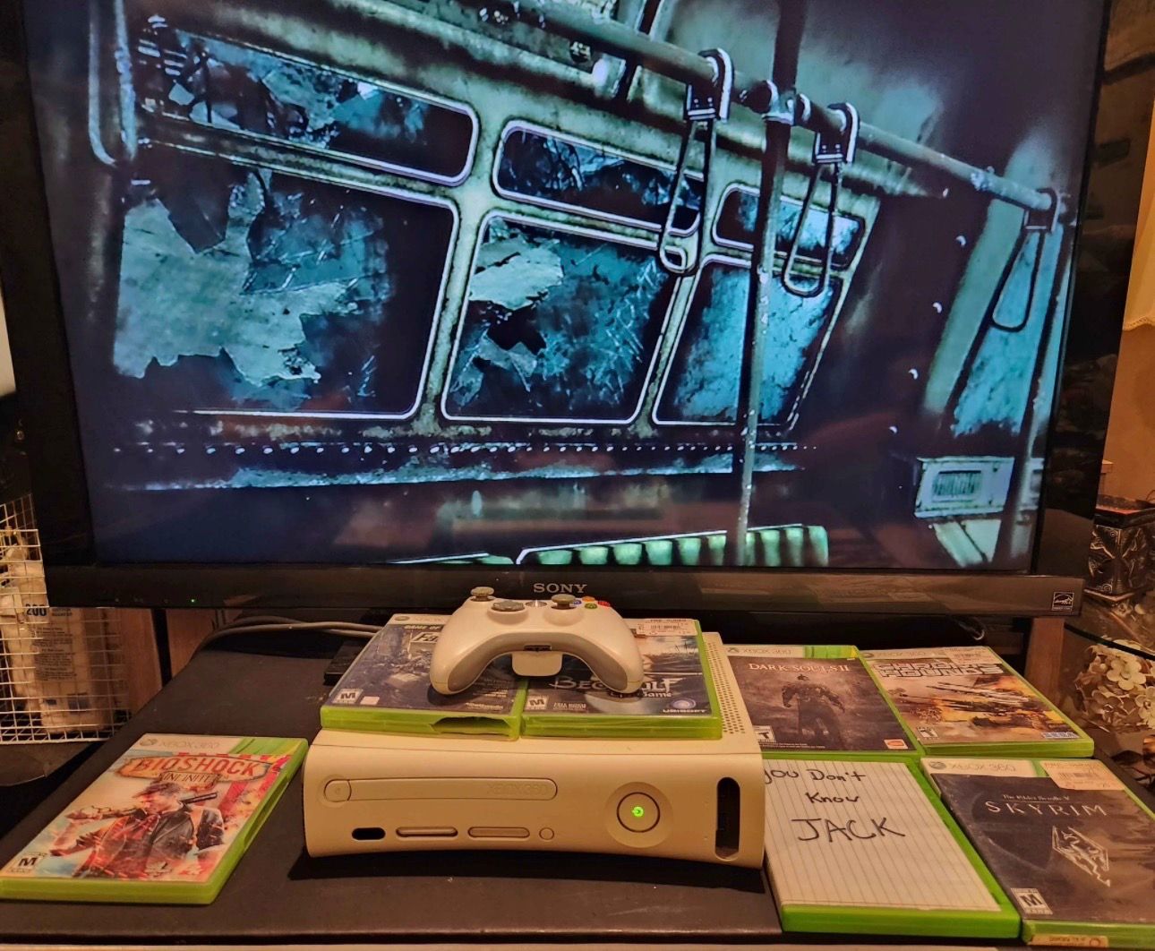 Xbox 360 with 7 games, controller and Sony Bravia 46” TV