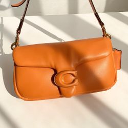 An orange handbag