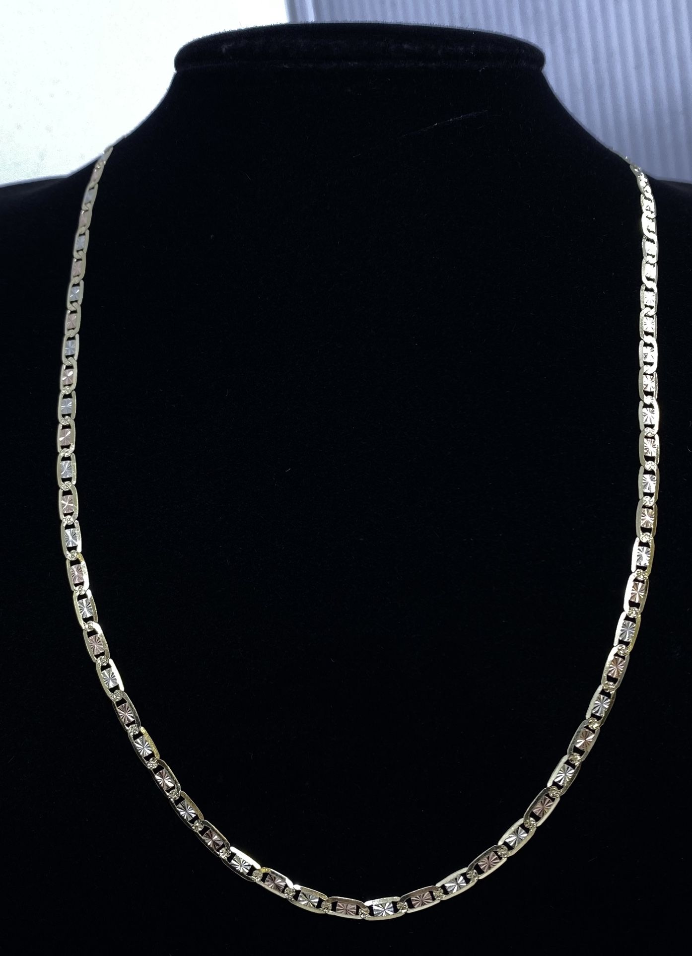 $950 Three Tone Gold Valentino Chain