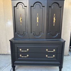 Amazing Mid century black and gold tallboy dresser