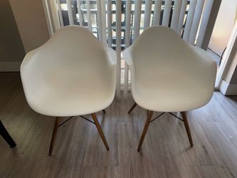 Eames style white plastic chairs