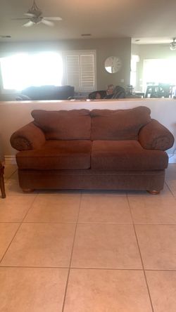 Brown small sofa
