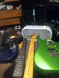 2 guitar bodies and 2 necks good shape 150 bucks cash