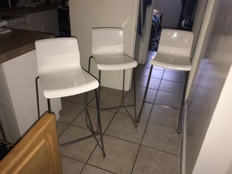 Three kitchen bar seats