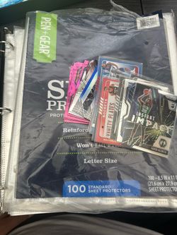 3 Ring binder w/100 sheet Protector for cards. Comes with. Lot of random NBA hoops and Prizm Cards