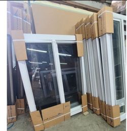 White Vinyl Sliding Windows New in Box