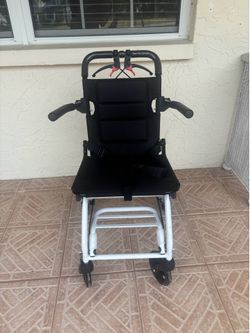 Portable transfer chair wheelchair