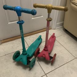 2 Scooters With Light On The Weels $10 Each 