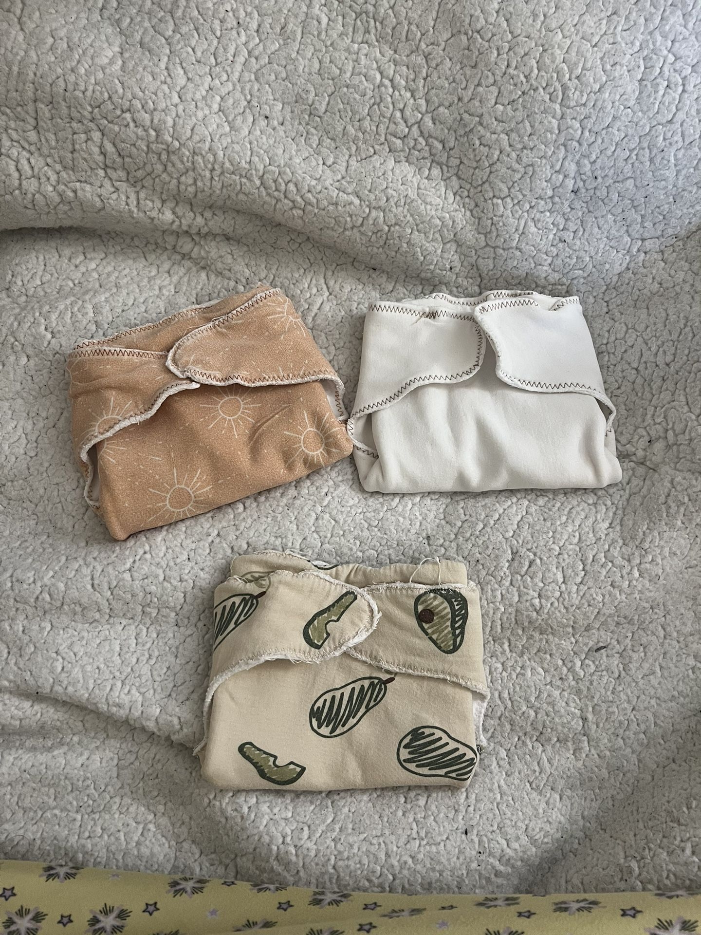 3 Newborn Flats And 1 Snappie