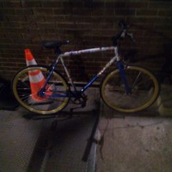 Blue Schwinn Bicycle With Stickers