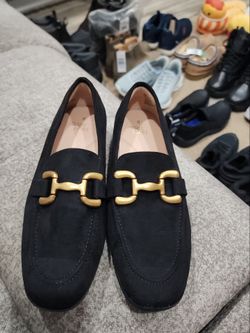 Black and gold shoes size 8