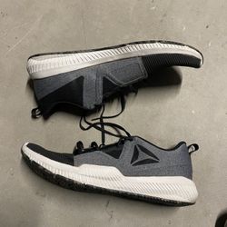 Black and grey Reebok’s 