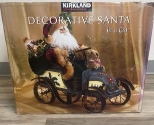 Vintage Kirkland Santa in a car