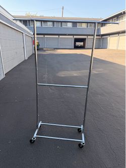 Clothing roll rack
