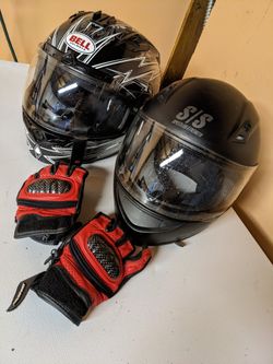 2 Helmets and a Set Of Gloves