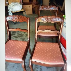 Six cherry wood antique custom embroidered seat chairs.