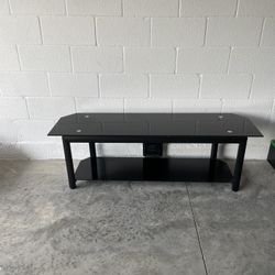 Modern black glass TV stand / media console in good used condition.