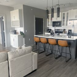 4 faux leather counter stools 