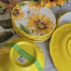 Sunflower melamine dinnerware set for 4 people, includes 12 pieces. Package opened but never used.