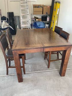 Pub height table with 4 chairs