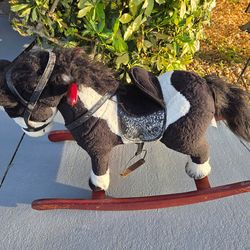 Plush rocking horse in good condition