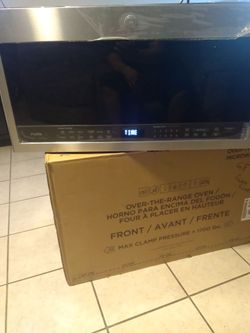 G.E. 2.1 cu. ft. Over the Range Microwave in Stainless Steel with Sensor Cooking, NEW