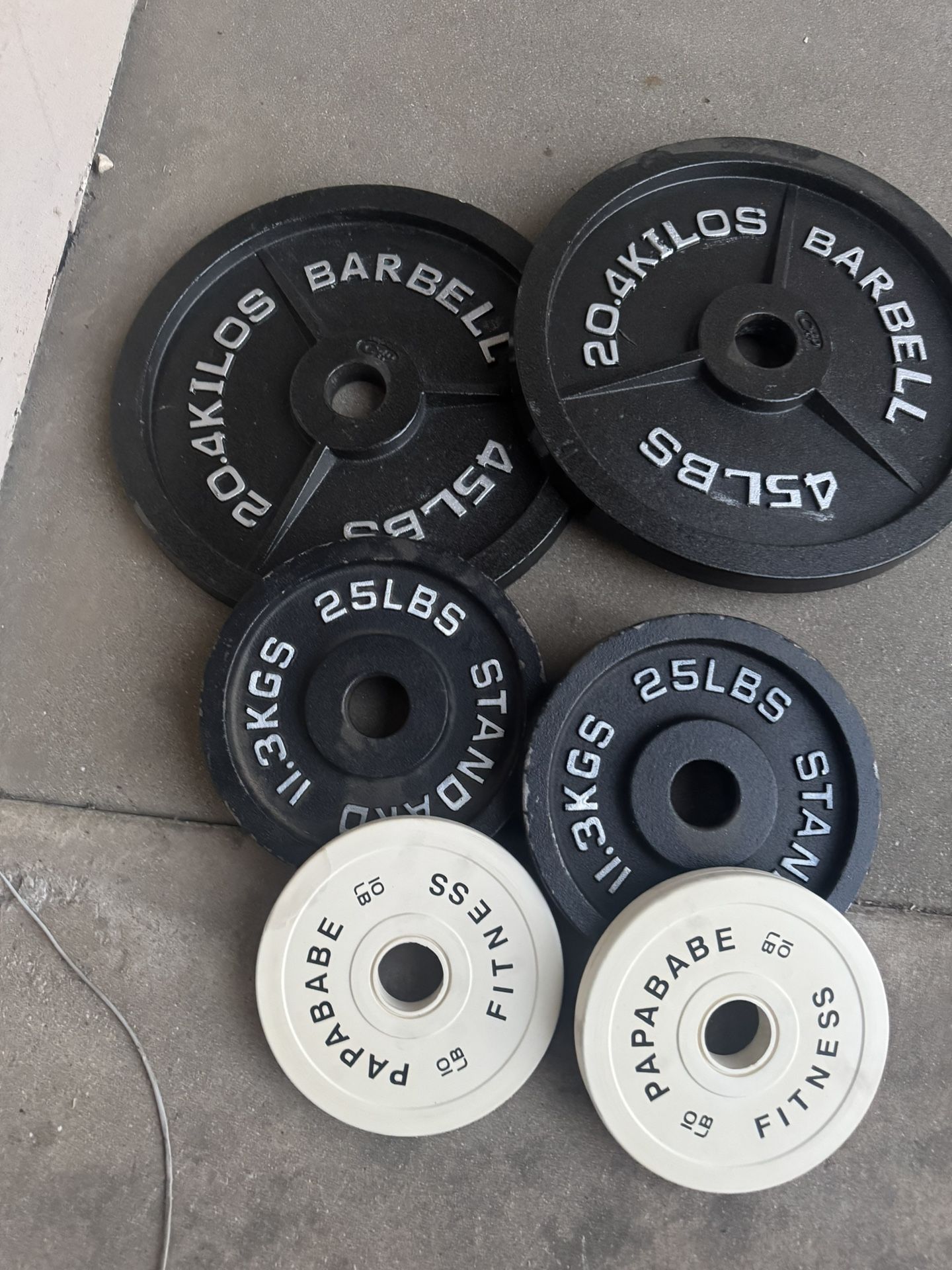160lbs of Olympic weights price firm 