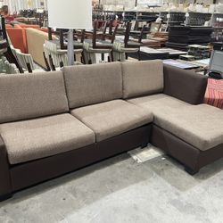 Brown “L Shaped” Sectional With Sleeper Bed