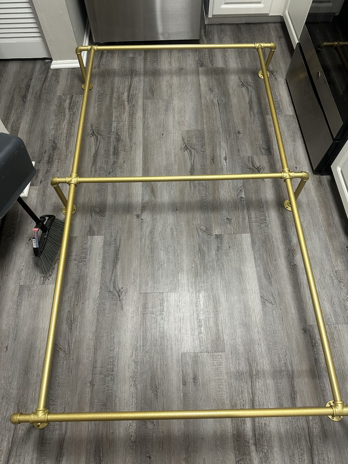 gold industrial pipe closet rack
