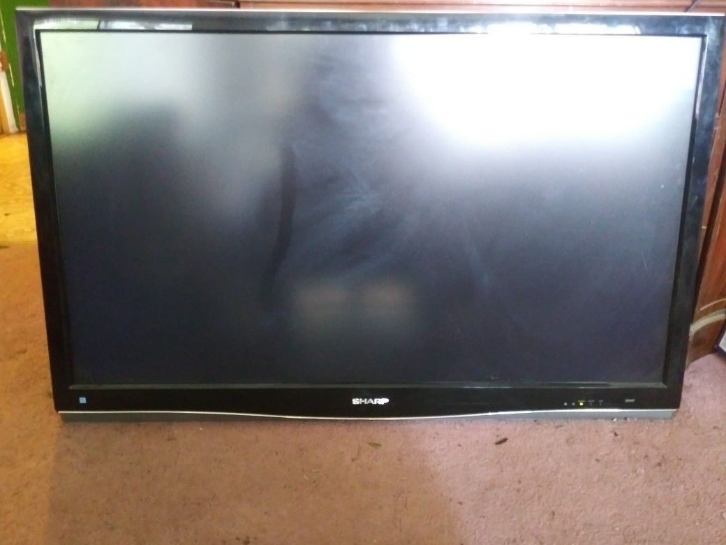 Sharp 46 inch TV with remote control and 3 HDMI ports