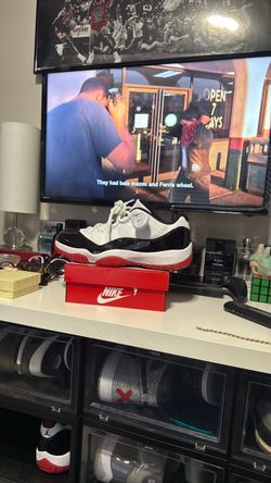 Air Jordan 11 Low White Black Red Sneakers