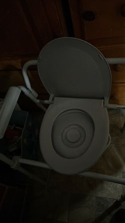 Portable toilet, gray brand new no scratch