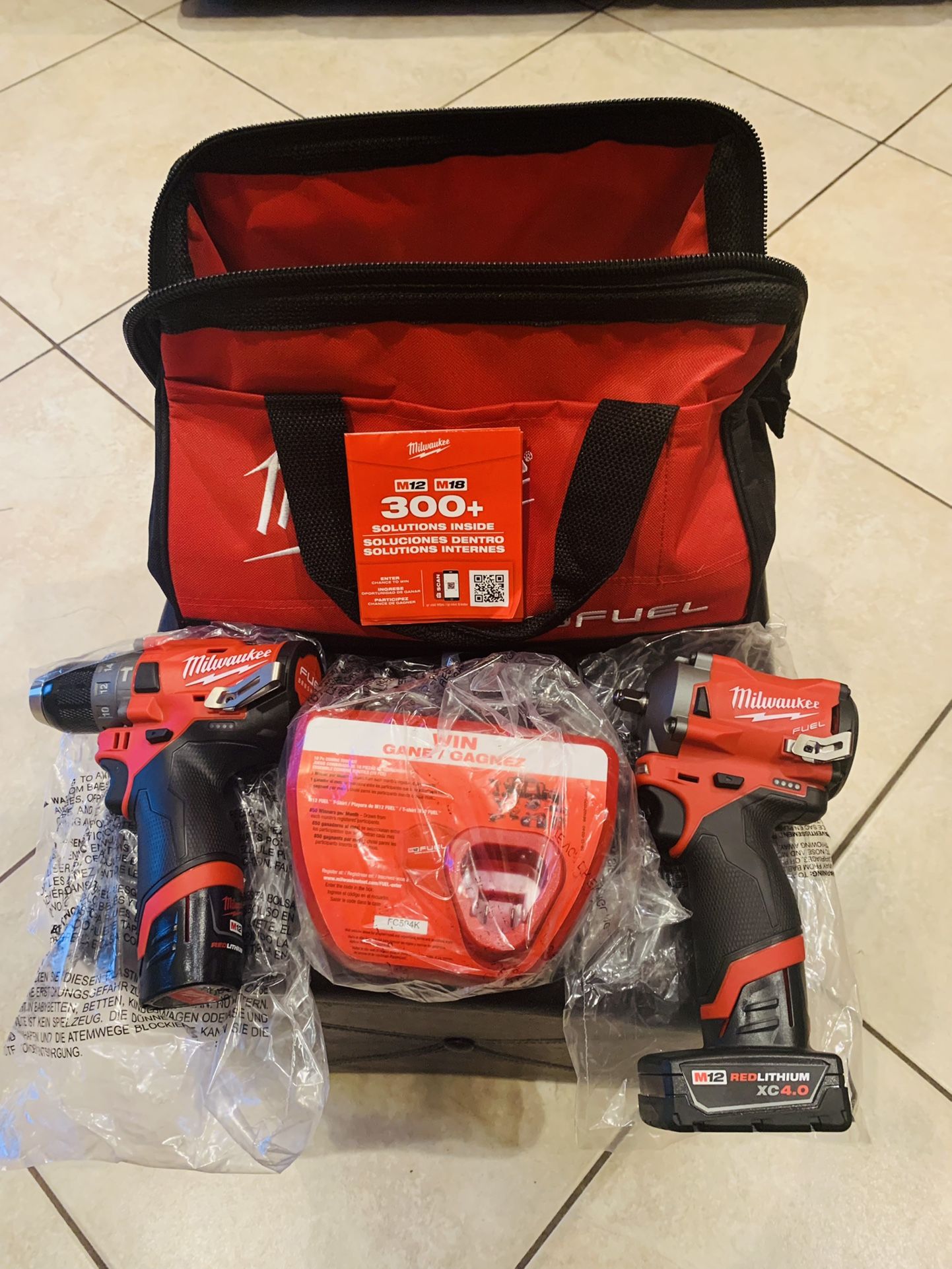 Milwaukee M12 Hammer Drill And Stubby 3/8 Impact Wrench New $330 Firm