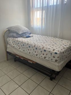 Trundle twin bed plus two mattresses - $150 OBO