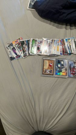 Hundreds of baseball cards good ones refractors rookie cards also some football mainly baseball