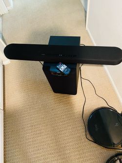 The Yamaha YAS-108 is a budget-friendly, ultra-slim sound bar featuring built-in dual subwoofers and DTS Virtual:X technology. It delivers immersive 3