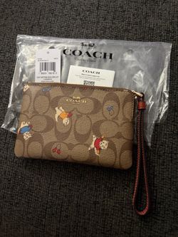 Coach cat mittens wristlet