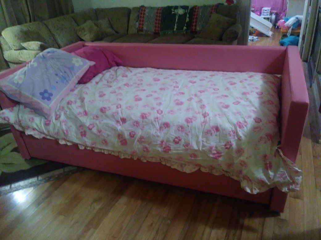 Pink trundle bed with top mattress