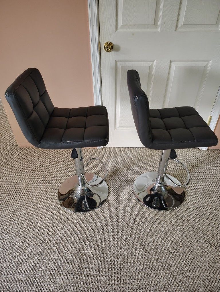 A Pair Of Grey bar Stools