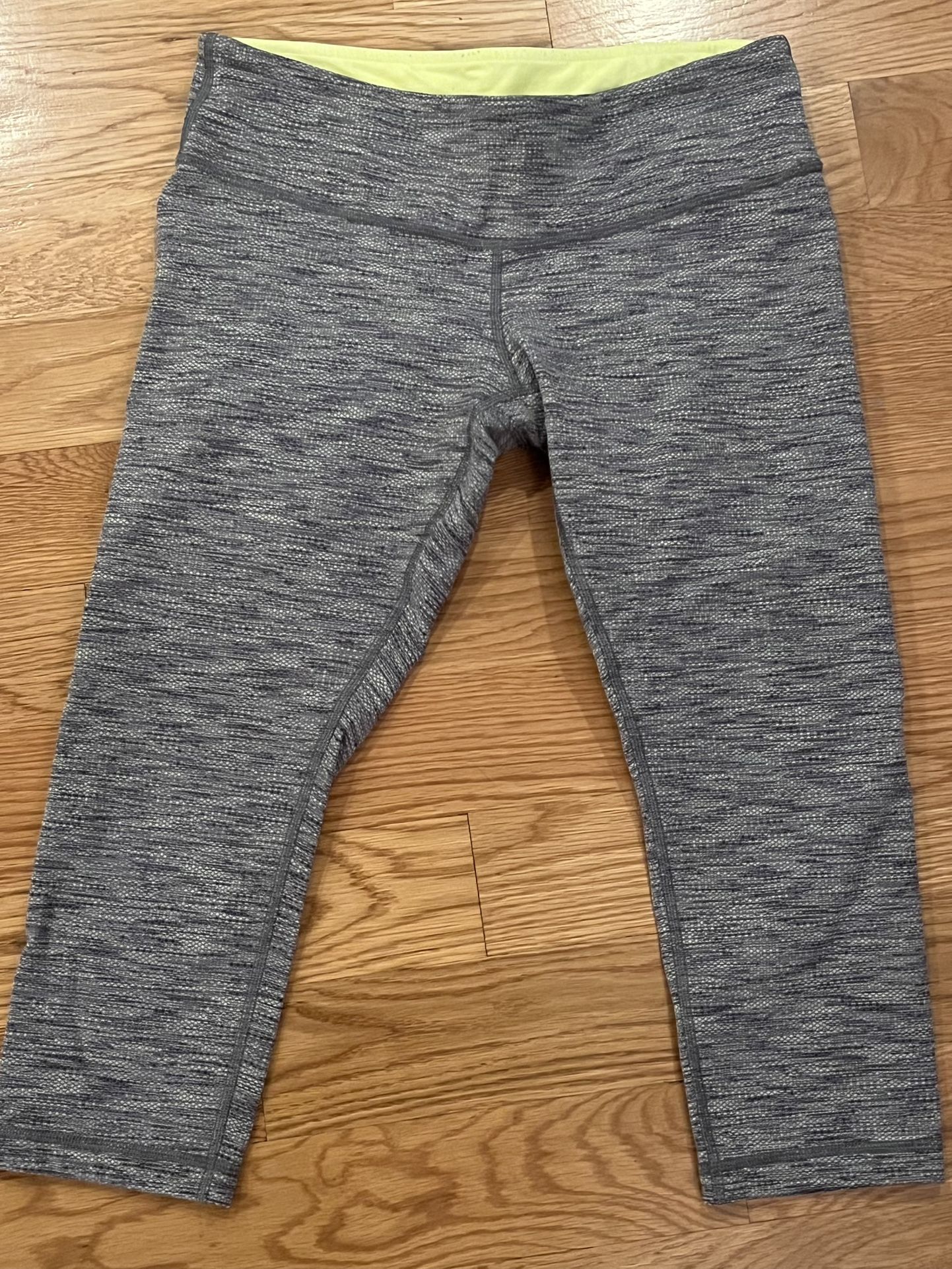 Lululemon Wunder Under crop leggings in a "space dye" pattern with a yellow waistband Sz 10