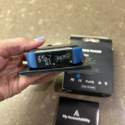 Blue fitness tracker watch, it has an alarm