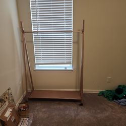 Pink Metal Clothes Hanger. 