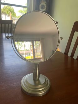 double-sided, 360-degree rotating vanity mirror