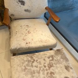 Stunning vintage cowhide chair and ottoman